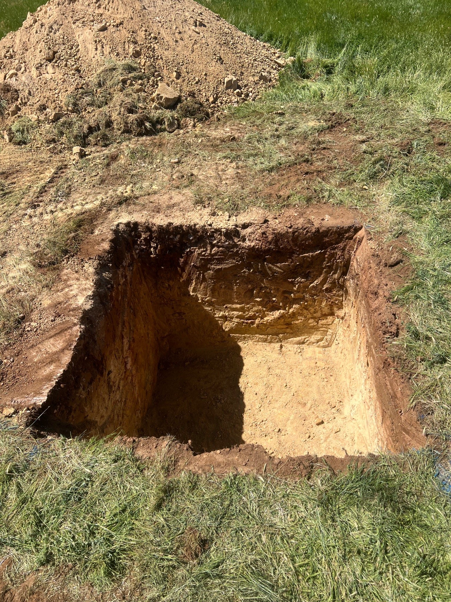 Excavated tank pit